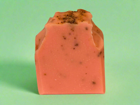 Nourishing handmade soap bar infused with refreshing blood orange essential oil and orange peels.