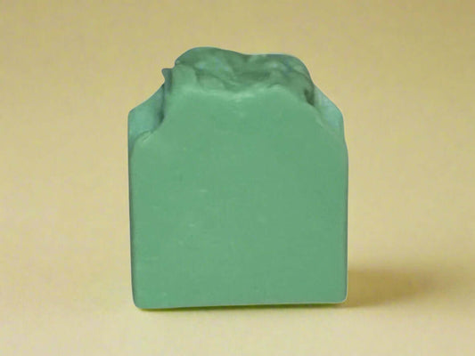 Handmade Pear-fection artisan soap in a refreshing green hue, perfect for nourishing and pampering your skin.